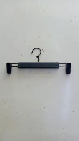 Deluxe Black Clip Hangers – Used (219 Pieces)