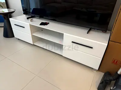 White modern TV stand / entertainment unit with drawers