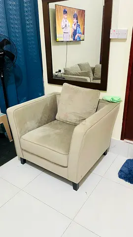 Light beige single-seater armchair in good used condition