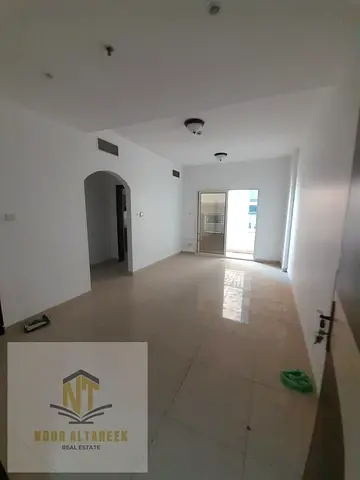 Spacious apartment for rent in Al Taawun with a comfortable layout, featuring 2 bedrooms, a large living room, 2 bathrooms, and a fully equipped kitch