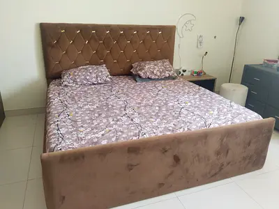 King-size upholstered bed with tufted headboard - beige