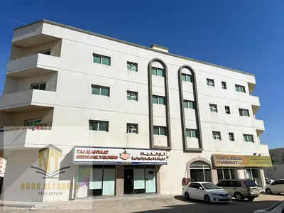 Building for Sale in Muwaileh Prime Location A strong investment opportunity to own a residential and commercial building in Muwaileh, located in a p