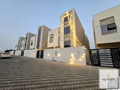 Direct from the owner, including all ownership fees: a villa in one of Ajman's most luxurious villas, built and finished to a super deluxe standard, w