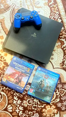PlayStation 4 Slim with DualShock controller + $% of War  Uncharted 3 (Used)