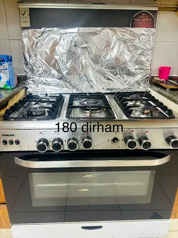 Used Nikai 5-Burner Gas Cooker with Oven - Good Working Condition
