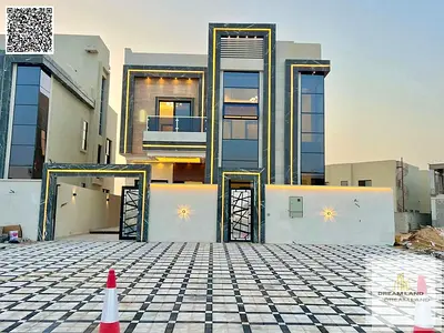Direct from the owner, including all ownership fees: a villa in one of Ajman's most luxurious villas, built and finished to a super deluxe standard, w