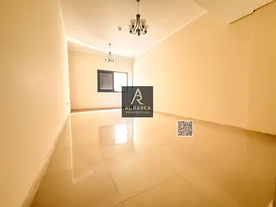 Two bedrooms and a living room for annual rent in Al Nuaimiya 1, plus maid's room with built-in wardrobes.