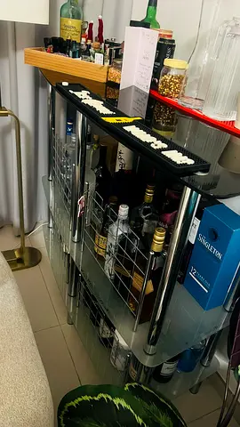 Compact glass and chrome bar without bottles