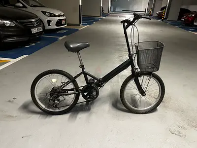 Compact folding city bike with front basket - used
