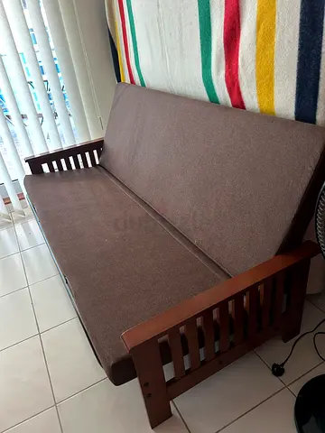 Brown futon used once