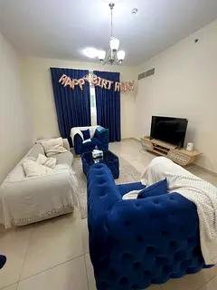 2-bedroom apartment with a living room in Al Qasba for monthly rent, modern furnishing, internet inc