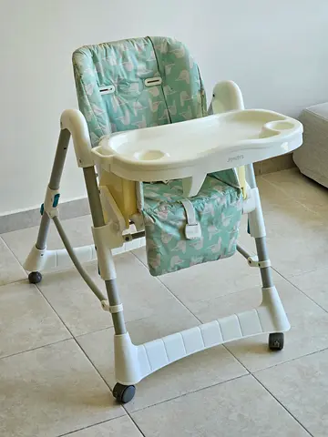 Used Adjustable Baby High Chair with Removable Tray — Light Green Pattern