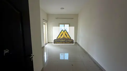 Al Mohandis Real Estate offers an exceptional 1-Bedroom Master + Hall apartment for annual rent. This unit is located in the second building from Ajma