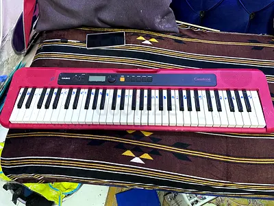 Casio 54-Key Pink Keyboard - Good Working Condition