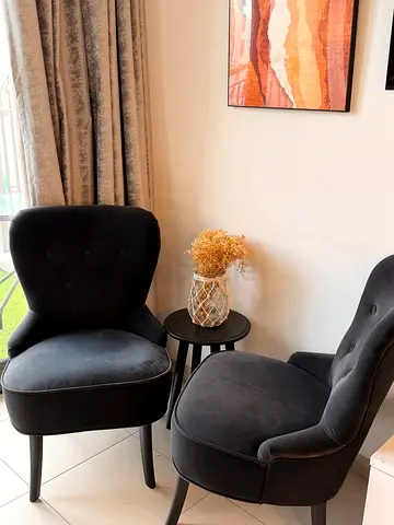 Pair of Black Velvet Accent Chairs with Side Table