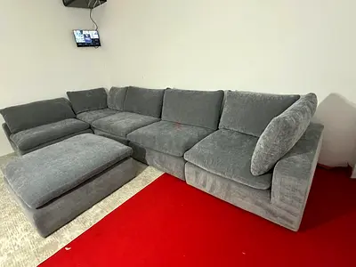 As perfect condition pan Emirates modular sofa