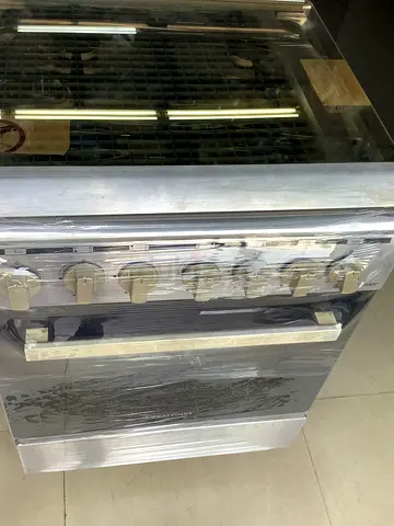 Stainless steel freestanding gas oven with 6 burners - good used condition