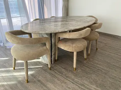 Round Marble Dining Table with 6 Upholstered Chairs - Beige. 2500aed