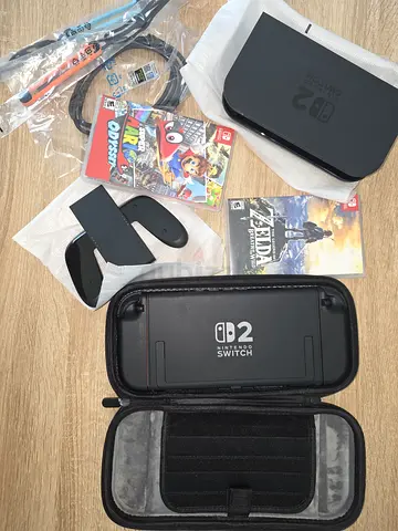 Nintendo Switch 2 — Mint, with Dock, Case + 2 Games (Zelda: Breath of the Wild  Super Mario Ody