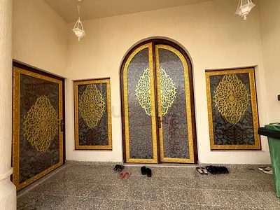 Set of Decorative Arched Metal Entrance Doors and Side Panels with Ornate Gold Pattern