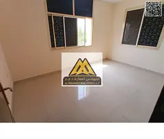 One-bedroom apartment with living room in Al Nuaimiya 2, Ajman, good space, split AC, prime location