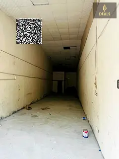 Commercial warehouse suitable for workshop or car wash in Al Rashidiya 1