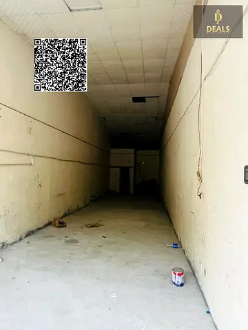Commercial warehouse suitable for workshop or car wash in Al Rashidiya 1