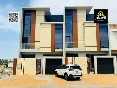Modern townhouse for sale in Al Helio 2 – Ajman | 5 master bedrooms + roof | Includes electricity, water, and central air conditioning