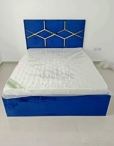 Blue Velvet Double Bed with Geometric Headboard