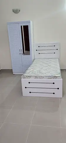 Brand New White Single bed with mattress and matching wardrobe