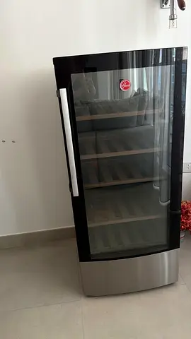 Single-door glass-front wine cooler / beverage fridge - great condition. Hoover model HWC58B-X