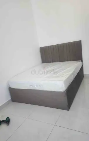 Queen bed frame with storage and mattress - grey upholstered