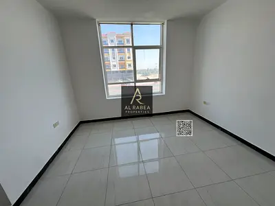 For annual rent in Ajman: two bedrooms, a living room, and two bathrooms in Al Muwaihat 3, near the academy.