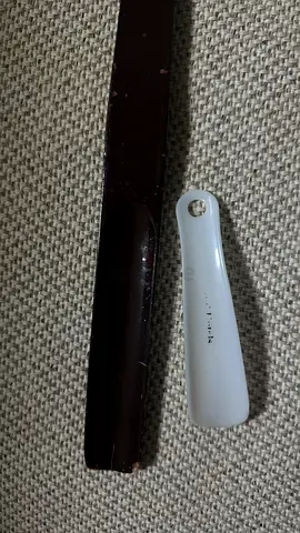 Pair of shoehorns (long wooden and short plastic) - used