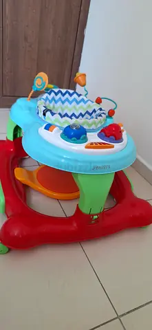 Baby activity jumper/walker with toy tray - good condition.