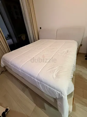 King upholstered bed frame without mattress topper - light beige