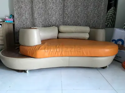 Curved Leather Sofa - Good Condition