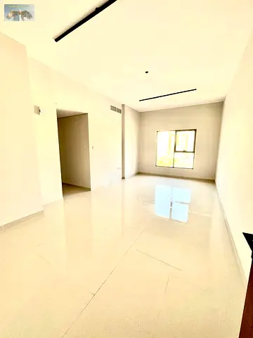 2BR hall apartment with high-end finishing for annual rent, prime location, easy exit, close to all services