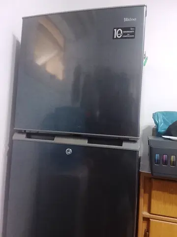 Small double-door refrigerator with freezer - good working condition