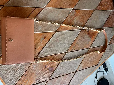 Tory Burch tan leather crossbody bag with gold chain