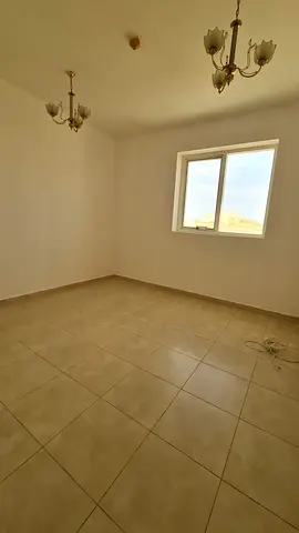 Room & hall in Al Qlai’a, free parking, 2 baths, second tenant, ready to move in, AED 30k, 4 paymen