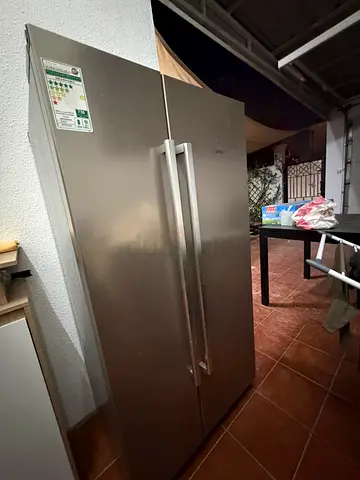 Side-by-side stainless steel refrigerator - good condition