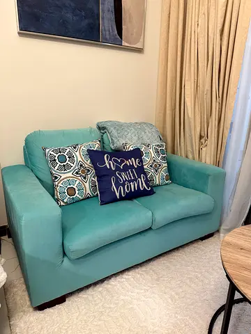 Light Teal 2-Seater Sofa in Good Condition