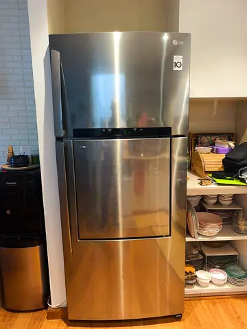 LG Stainless Steel Top Freezer Refrigerator - Good Condition