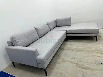 As perfect condition west elm sofa with footstool
