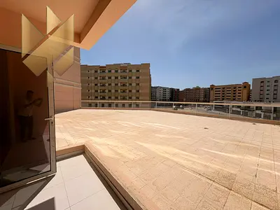 Two bedrooms and a living room for annual rent in Muwailih Al Jadeeda, second occupancy, large spaces and excellent finishes with a rooftop terrace.