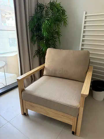 Light Wood Armchair with Neutral Cushions - Good Condition