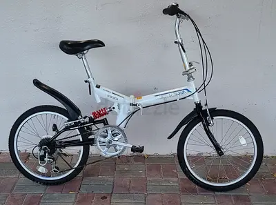 Compact folding bicycle - 20 wheels, 6-speed, rear suspension
