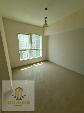 A unique opportunity: a two-bedroom master apartment with a living room in the heart of Al Majaz 1, with no fees.