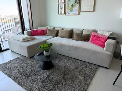 L-Shaped Sofa Set with coffee table and carpet